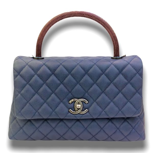 Used in good condition ! Chanel Coco 10.5” Navy caviar with red lizard handle Rhw Holo 23